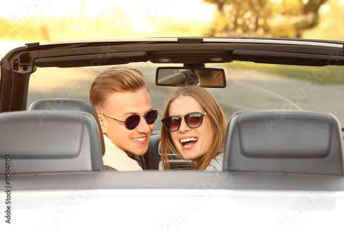 Happy young couple in car on road trip © Africa Studio
