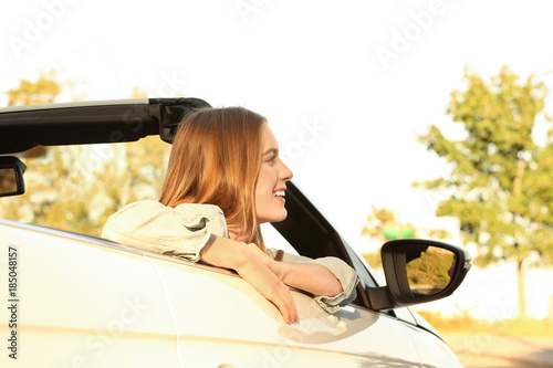Beautiful young woman in ca...