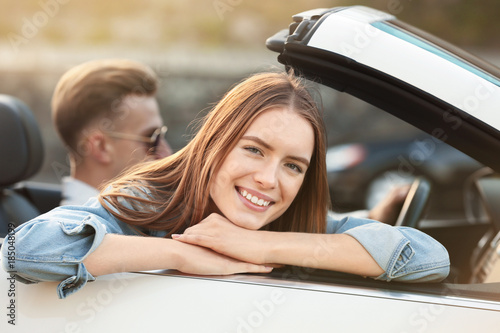 Beautiful young woman in ca...