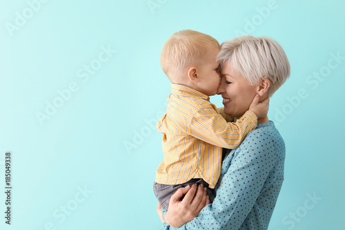 Young mother holding her ba...