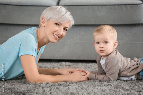 Attractive young mother wit...