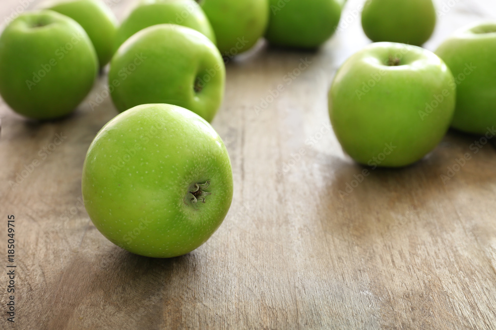 Fresh green apples on wooden background Fresh green apples on wooden background