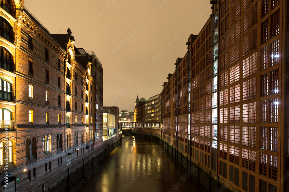 Red brick houses of Hafen City in Hamburg in the evening, located on the Elbe river. 