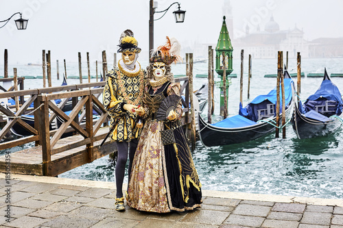 Venice carnival 2017. Venetian Carnival Costume. Venetian Carnival Mask. Venice, Italy. Opposite San Giorgio © Ihor