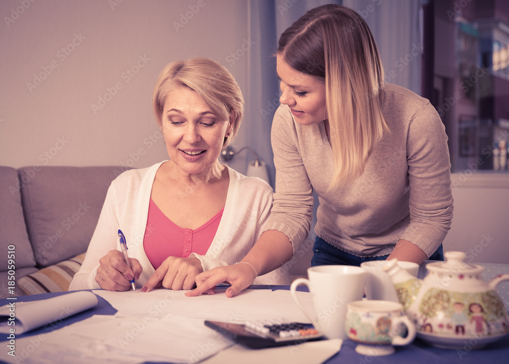 Daughter helps mother to lead home accounting