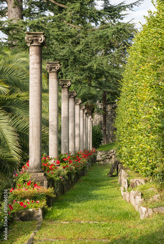 Tableau sur toile colonnade with classical columns in formal garden at Villa Helenum, Lugano, Swit