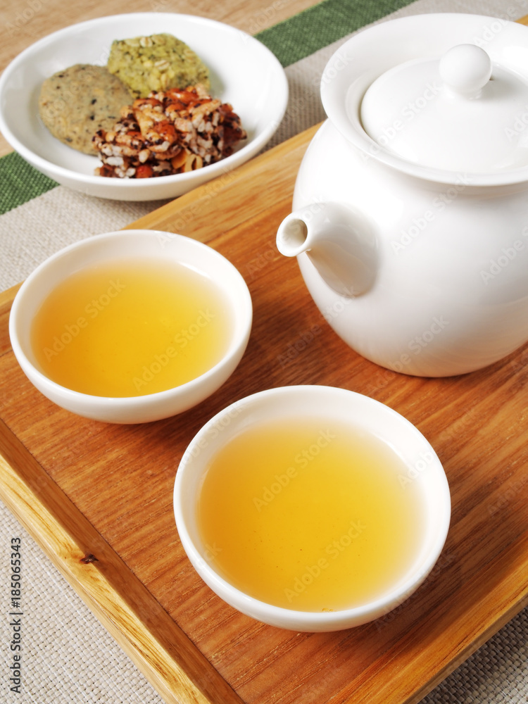 Chinese tea set with refreshments on the table Chinese tea set with refreshments on the table