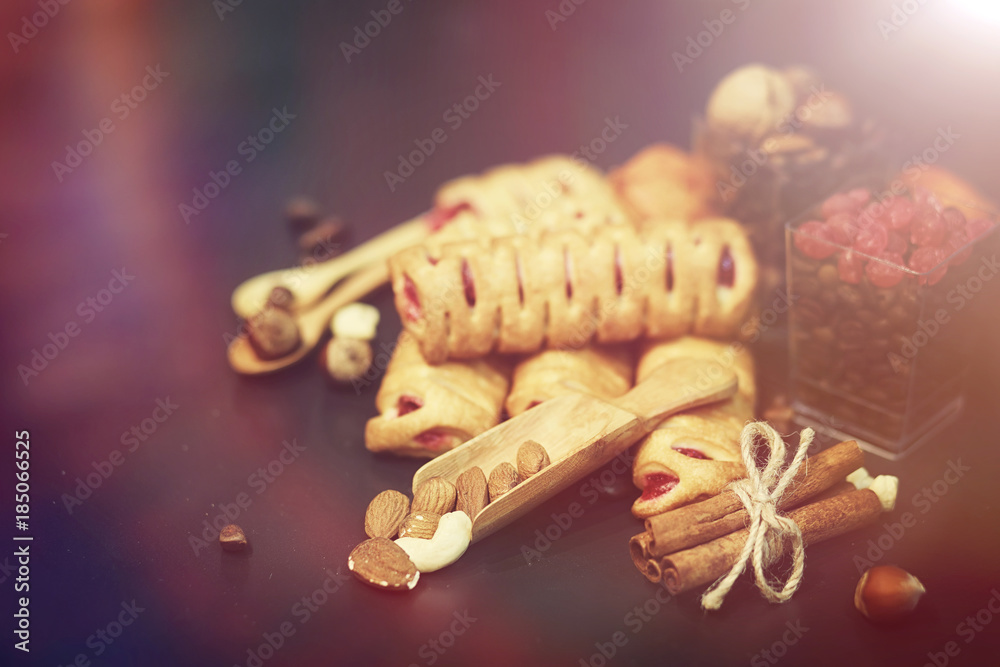 Set for breakfast. Sweets and pastries with nuts for tea on a bl Set for breakfast. Sweets and pastries with nuts for tea on a bl