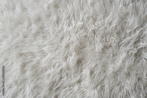 close up of a white wool rug