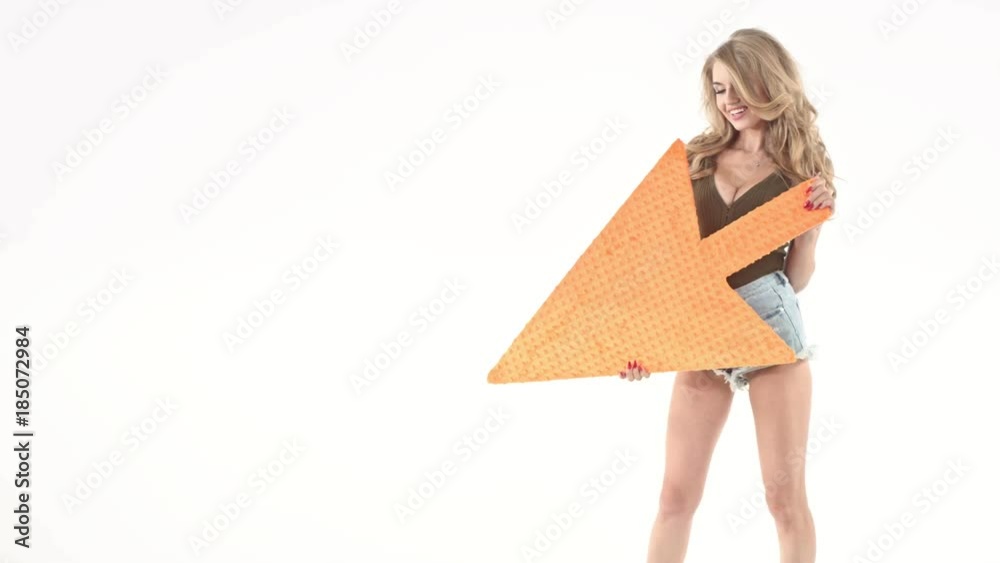 Pretty woman holding an arrow - ad