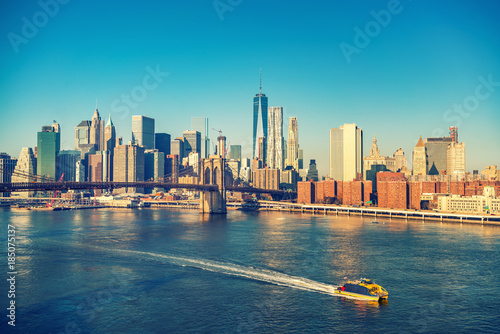 Brooklyn bridge and Manhattan at sunny day, New York City © sborisov