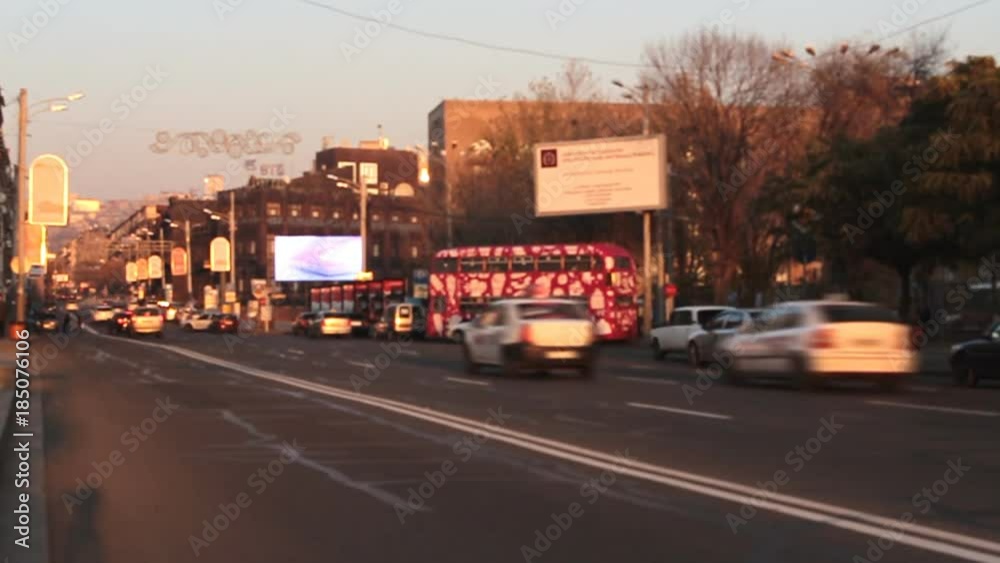 Time lapse Traffic Cars with pedestrian at sunset. Defocused video Time lapse Traffic Cars with pedestrian at sunset. Defocused video