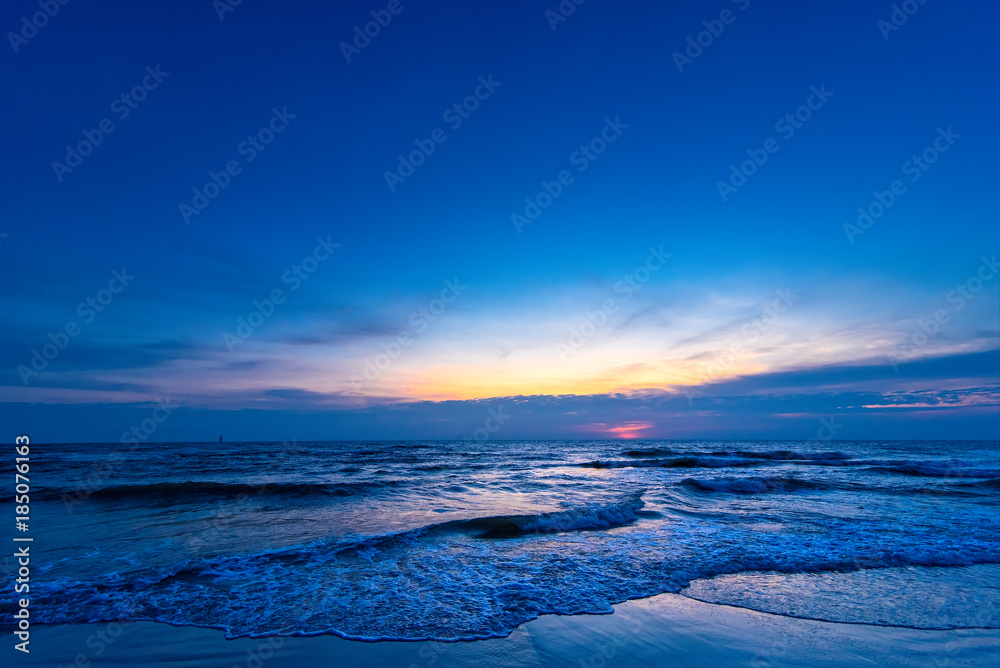 Beautiful color of the sunrise over sea background, ocean in southern Thailand.