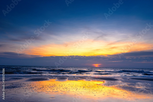 Beautiful color of the sunrise over sea background, ocean in southern Thailand.