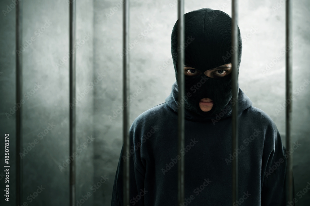 Masked thief in prison Masked thief in prison