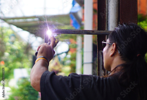 Technician is using heat welding steel