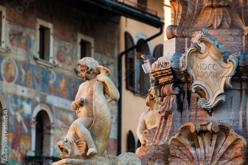Close view of fountain of Neptune in Trento, Italy photo