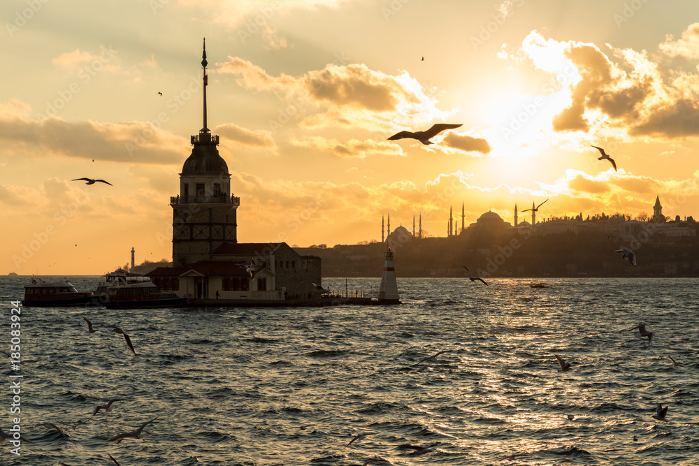 the Maiden's Tower and the skyline of Istanbul at sunset