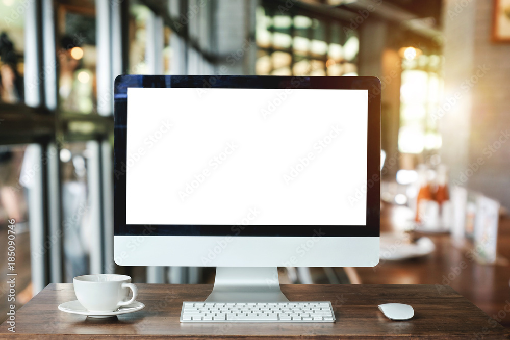 Computer Monitor, Keyboard,coffee cup and Mouse with Blank or White Screen Isolated is on the work table in the coffeeshop
Computer Monitor, Keyboard,coffee cup and Mouse with Blank or White Screen Isolated is on the work table in the coffeeshop