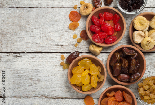 Fototapeta Naklejka Na Ścianę i Meble -  Dried fruits on wooden background