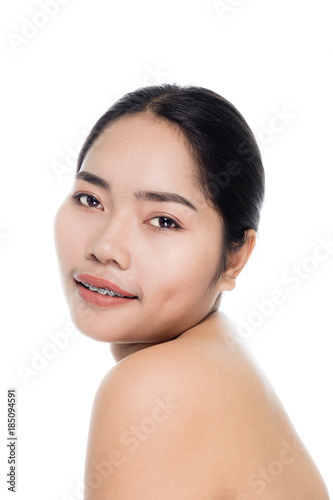 Beautiful woman face close up portrait studio on white background