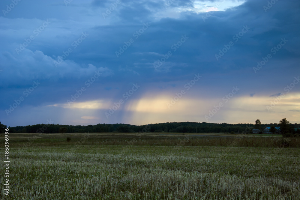 Rain and clouds over the meadow Rain and clouds over the meadow