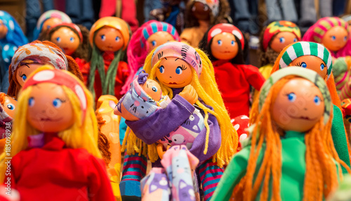 The faces of the colored dolls of cloth. Close up.