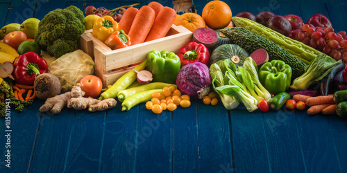 Fototapeta Naklejka Na Ścianę i Meble -  Top view of fresh vegetables on table, Fresh vegetables in wooden container with copy space