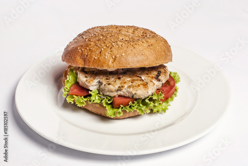 classic burger on a white plate