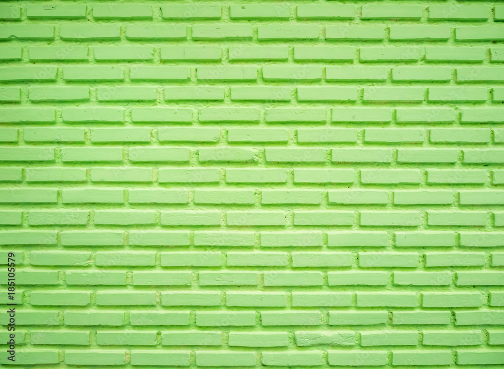 Fototapeta premium Green brick wall, used for background image.