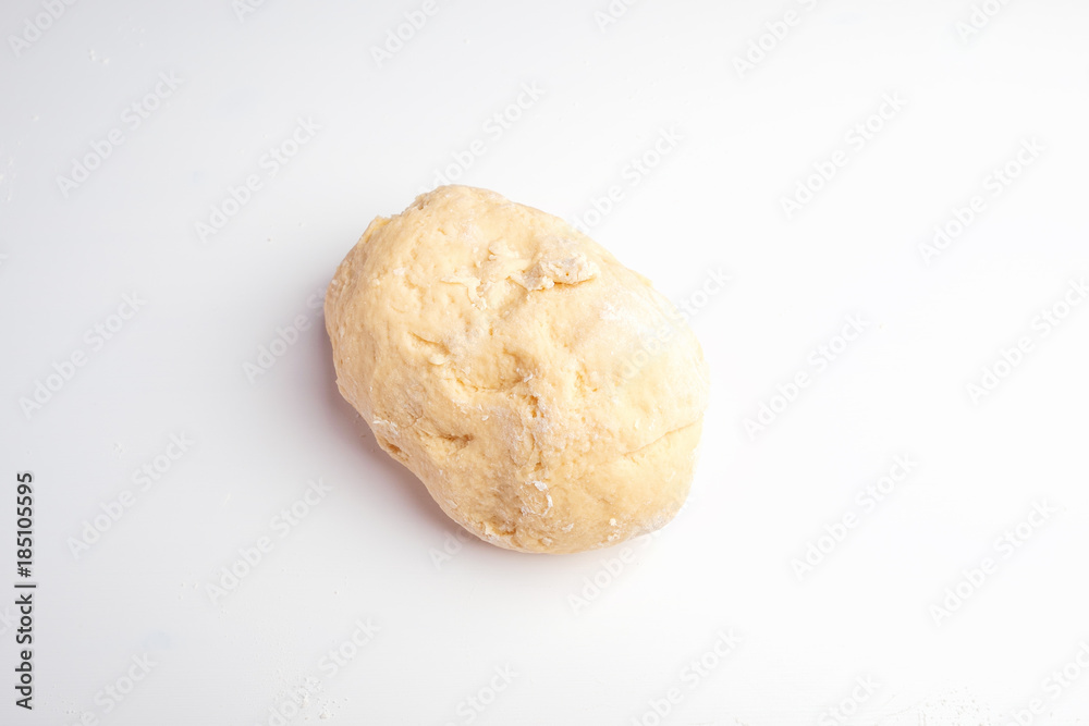 dough for baking cookies on a white table dough for baking cookies on a white table