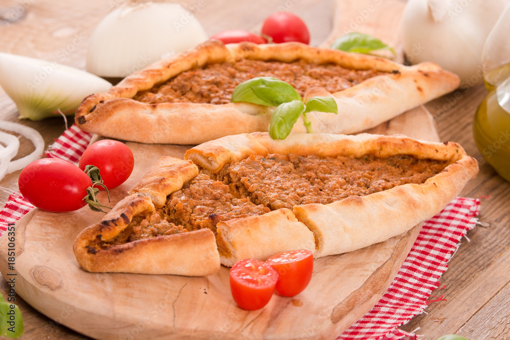 Turkish pide pizza with meat and onion. Turkish pide pizza with meat and onion.