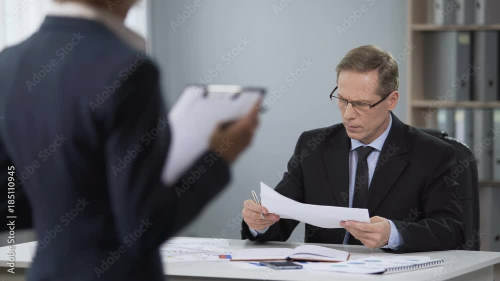 Business man worried about work of company accountant, low income, bad results Business man worried about work of company accountant, low income, bad results