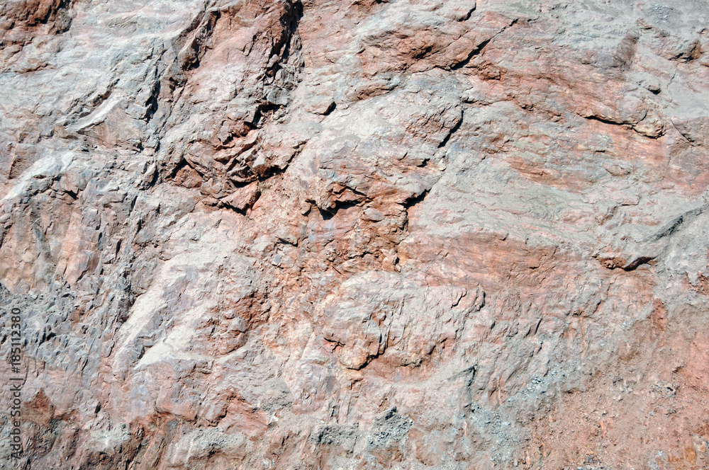 natural full frame background of porphyry rock wall