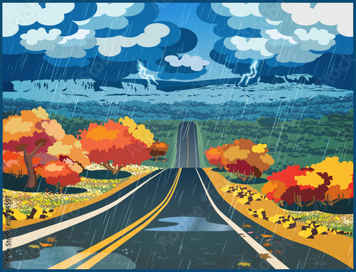 Autumn road through the valley