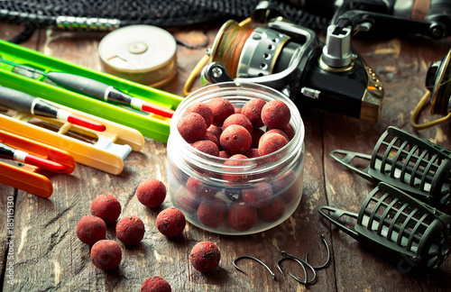 fishing gear on old background photo