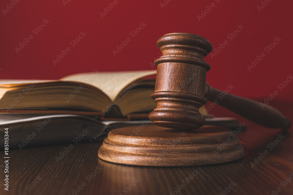 opened juridical books with hammer on wooden table, law concept opened juridical books with hammer on wooden table, law concept
