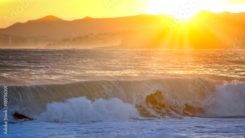 Beautiful sunset in Spain with big waves, Costa Brava