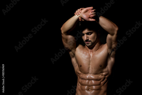 Man with muscular body and bare chest or coach sportsman