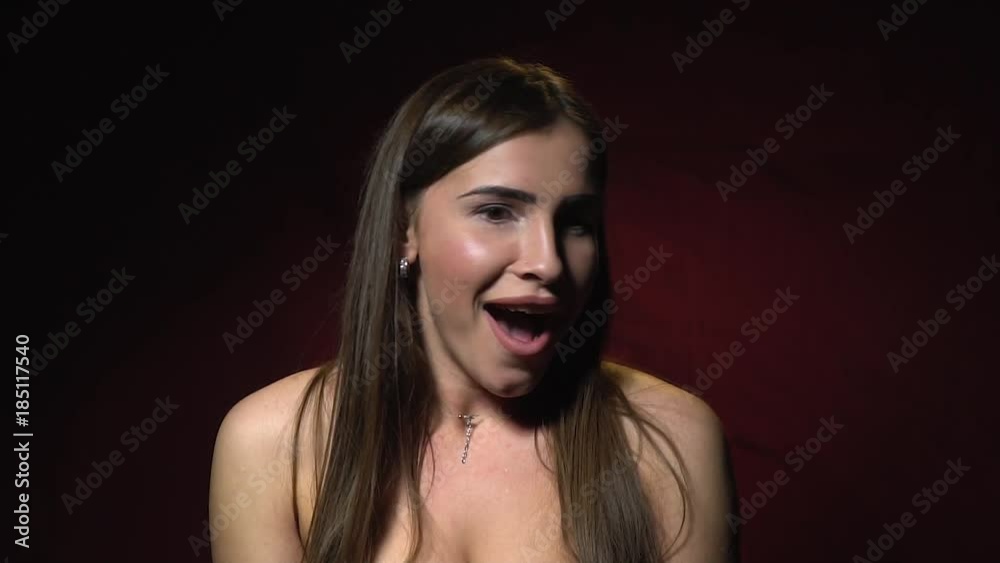 Sexy brunette experiencing joyful surprise Sexy brunette experiencing joyful surprise