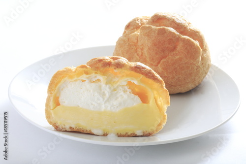 Cream puff on a white dish