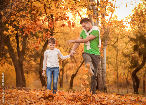 Father and his son playing ...