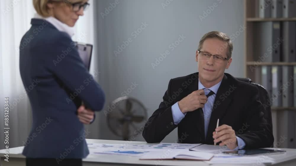 Male boss looking attentively lustily, problem chief, inappropriate behavior