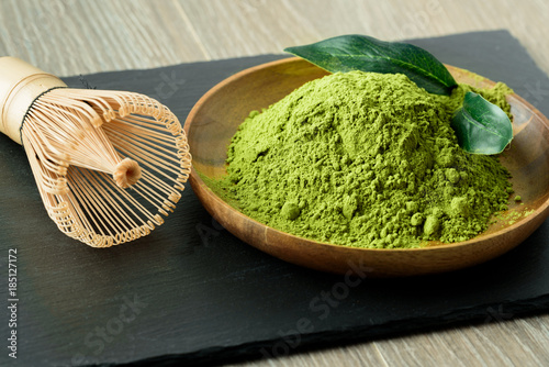 Japanese green tea matcha in a wooden bowl photo