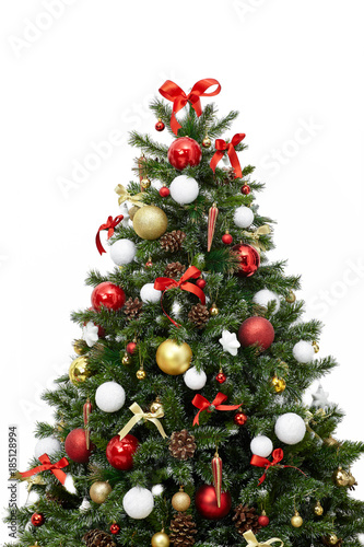 Beautiful christmas tree with colorful ornaments isolated on a white background, studio shot