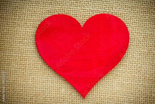 Heart isolated on a burlap fabric. Valentines Day and love concept