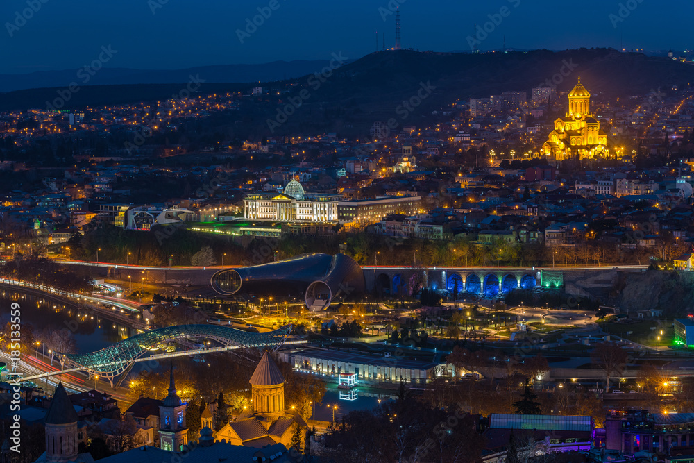TBILISI, GEORGIA - DEC.12, 2017 : Holy Trinity Cathedral of Tbilisi at dusk view from the hill