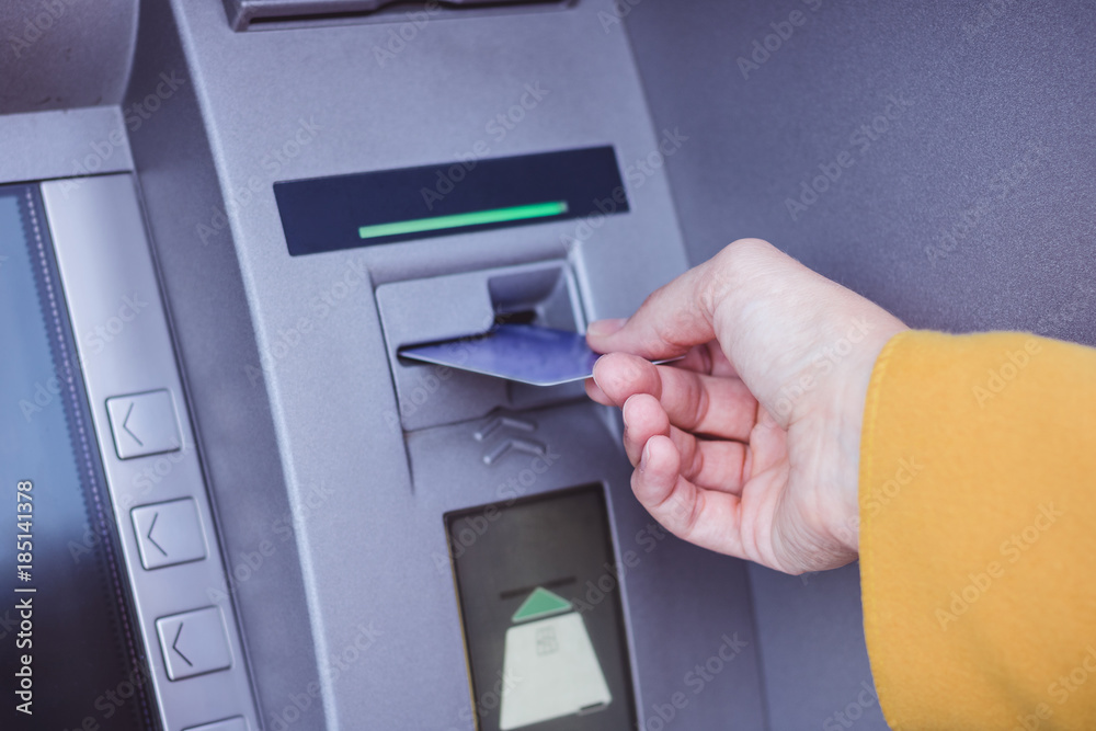 Close up of withdrawing money from ATM. Close up of withdrawing money from ATM.