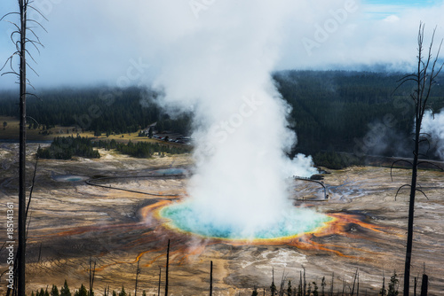 Majestic view of steam emitting from hot spring at Yellowstone National Park