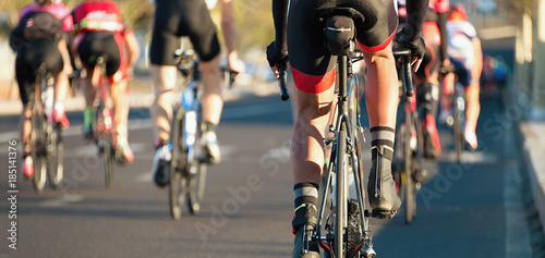 Cycling competition,cyclist athletes riding a race in the light of evening